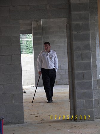 Pastor John looking over the Asbury Construction 7 25 2007
