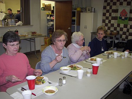 Asbury Men's Cooking Demo 2007: ladies enjoying the variety of dishes