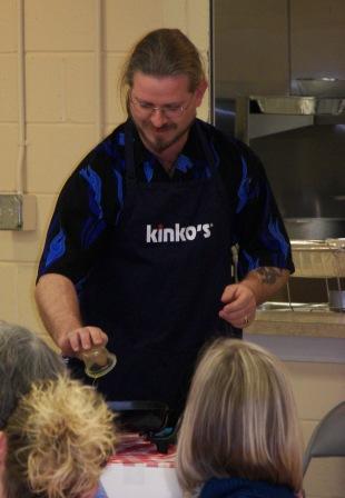 Chef Nelson serving Chicken Cacciatore