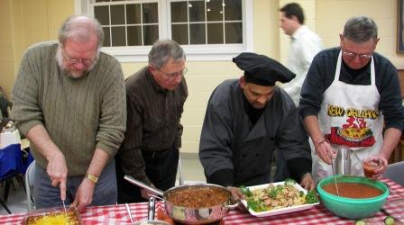 chefs serving their guests...